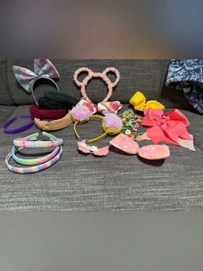 Bundle of girls hair accessories and a small little girls purse.